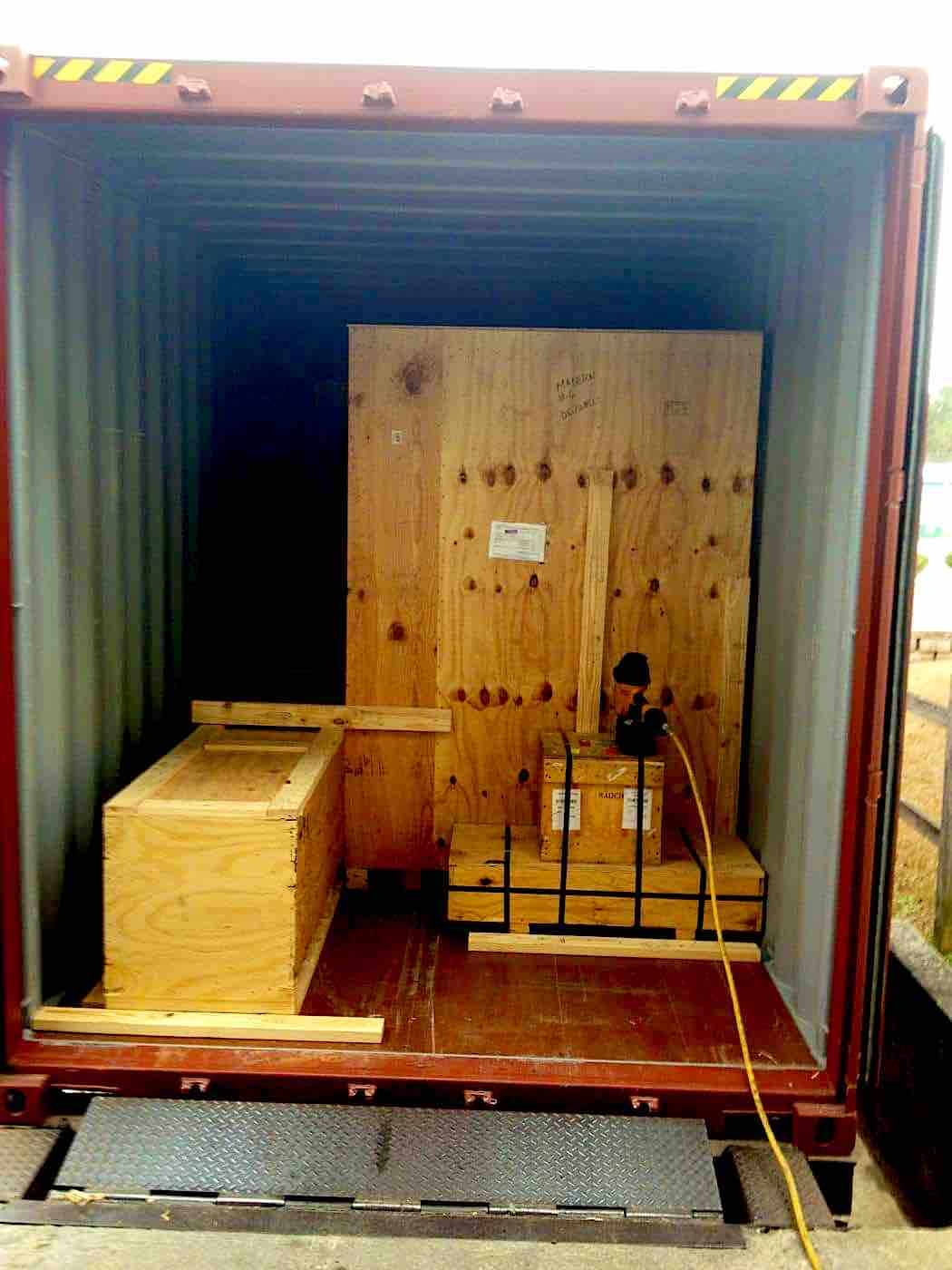 Wooden crates braced inside an ocean shipping container