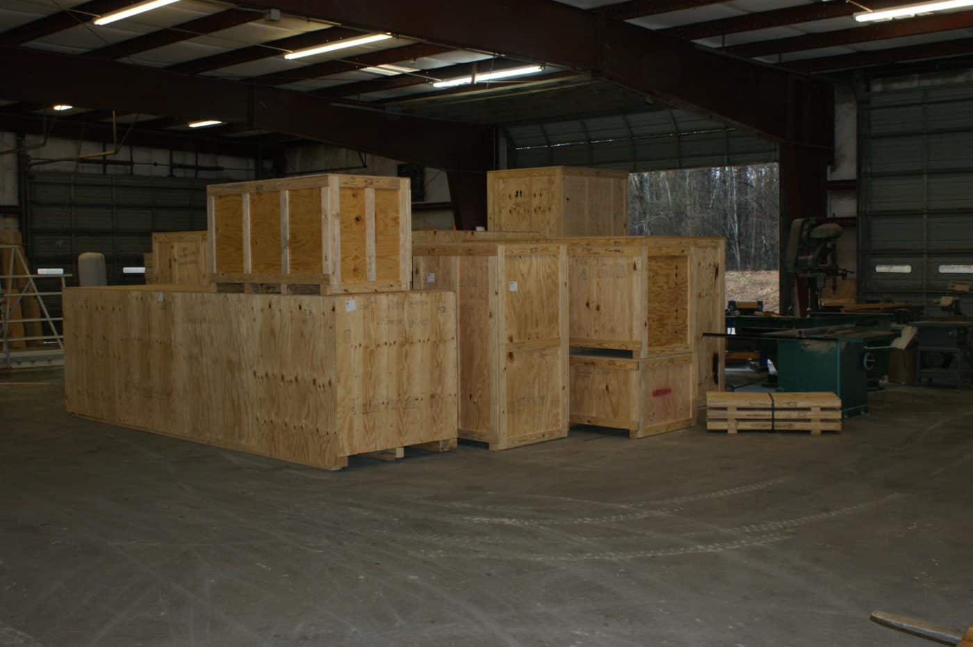 Finished wooden shipping crates stacked in a warehouse